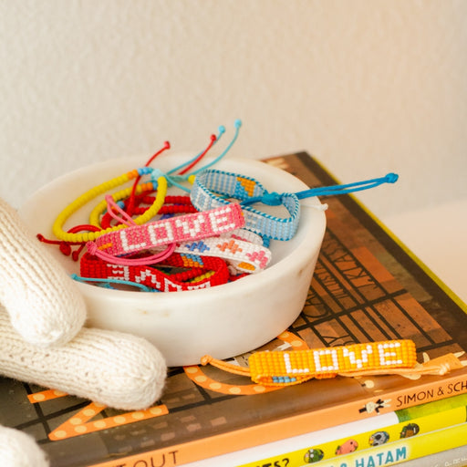 Kids Woven LOVE Bracelet - Red/White lifestyle image