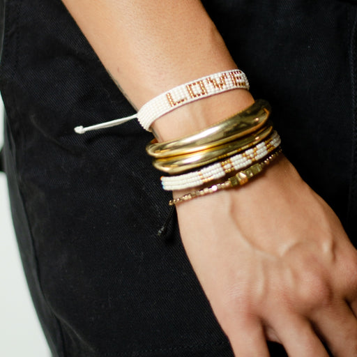 Woven LOVE Bracelet - Pearl/Gold lifestyle image