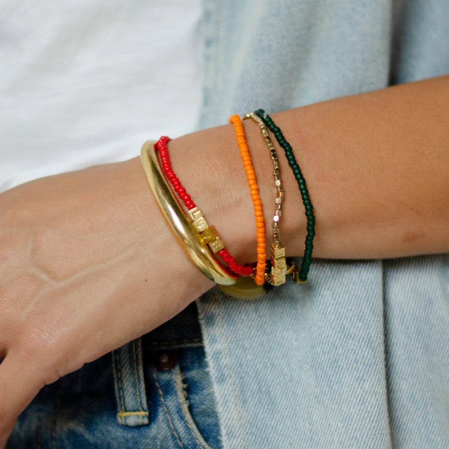 FINAL SALE: Elastic Single Strand with Cube Brass LOVE Beads - Orange